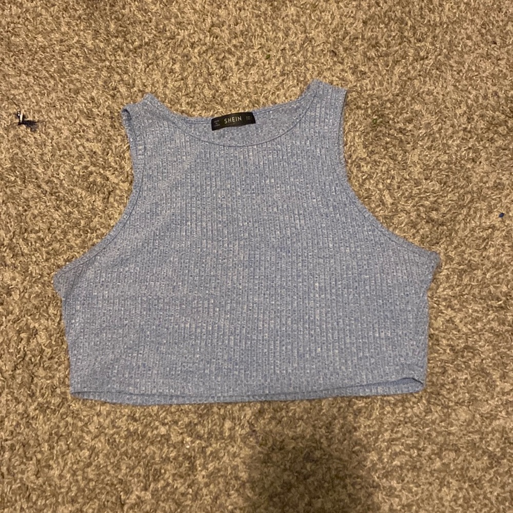 Blue knit form fitted crop tank top.